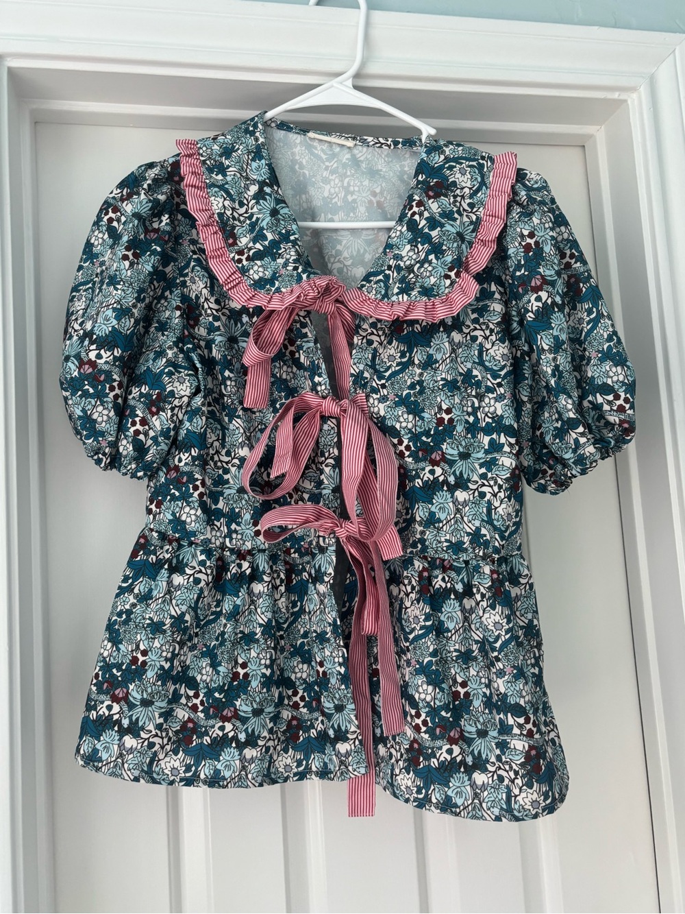 Sunday up Teal Floral Peplum Top with Pink Ribbon Trim